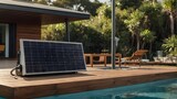 Fototapeta  - With visible solar panels and a hardwood deck, this modern solar-powered swimming pool pump has people in a fuzzy background.