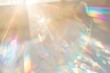 White background with bright iridescent sunlight flares and colorful refractions
