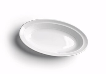 a white oval plate on a white background