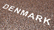 Concept or conceptual large community of people forming the word DENMARK. 3d illustration metaphor for culture, history and education, politics, economy and business, travel and adventure