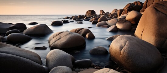 Aufkleber - Rocky shore by water