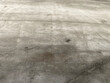 Detailed image showing the rough texture and patterns of a concrete surface