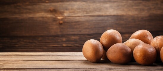 Canvas Print - Eggs on a wooden table