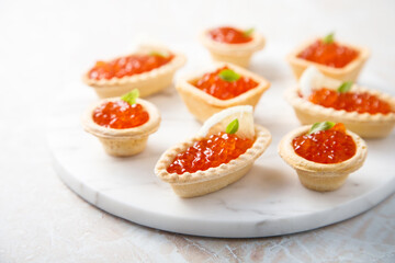 Canvas Print - Red caviar served in tartlets