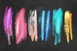 Assorted paint colors on a blackboard, suitable for design projects