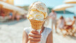 Happy smiling little girl holding in hand scoop of crave-worthy creamy vanilla ice cream in waffle cone. Beach sea