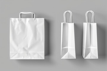 Poster - Three white paper bags on a plain gray background. Suitable for packaging and retail concepts