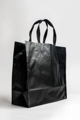 Aufkleber - A simple black shopping bag against a white backdrop. Perfect for e-commerce or retail concepts