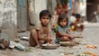 Children sitting on a dirty sidewalk, begging for food.