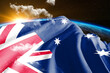 Australia national flag cloth fabric waving on beautiful night global cloud Background.