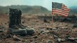 A pair of combat boots next to an American flag planted in the ground.