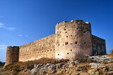 Fototapeta  - Stone walls of the Turkish castle of Aptera on the greek island of Crete