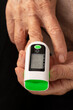© Pixel_Studio_8 - Senior woman using pulse oximeter on her finger at home