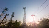 Fototapeta  - Power line for telecommunication tower in rural.