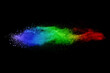 abstract powder splatted background. Freeze motion multicolor powder explosion on black background