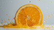Juice in the shape of drop flowing from a slice of orange, on white background 