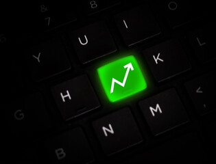 Poster - Business Growth Concept Backdrop with Green graph going upward on the keyboard. Arrow pointing towards upside direction, background