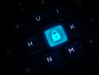 Poster - Security concept design with glowing lock on the keyboard button in blue color, backdrop. Safety design with keyboard button concept