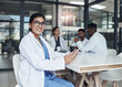 © peopleimages.com - Portrait, woman and tablet for medicine research, wellness and diversity in office for healthcare. Nurse, medical student and residency in hospital with digital notebook for brainstorming diagnosis