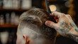 © Luluraschi - rear view close up of young caucasian man getting a fresh new hair cut style, professional barber or hair styler at work