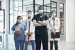 © peopleimages.com - Portrait, doctors and nurses in hospital as team for collaboration, healthcare and partnership for clinical trial or help. People, diversity and technology for online research or records and work.