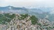 Aerial view of aizawl city capital of mizoram view over the houses and building on the hills in aizawl, mizoram, India, asia