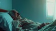 © masyastadnikova - An elderly man in bed in close-up. Elderly care, hospice care. Long-term care for the elderly, rehabilitation