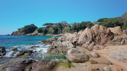 Wall Mural - Nestled along the rugged coastline of Costa Brava, Cala San Francesc enchants with its azure waters and lush greenery, offering a serene escape from the bustling world.