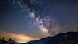 b'Starry Night Sky Over Mountain Landscape'
