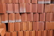 Stack of roof bricks. Thermal ceramic brick. Bricks for construction of houses and buildings. Concept of construction, building, works of architecture, urban plan.