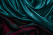 Teal and maroon blend abstractly on velvety black.