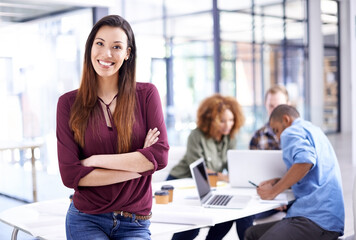 Canvas Print - Portrait, meeting and business woman with arms crossed in office for teamwork, review or planning. Company, smile and person for collaboration, discussion or professional at interior design agency