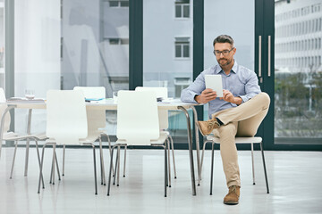 Leinwandbilder - Businessman, tablet and research in office for project development, startup company and email. Digital notebook, male person and brainstorming idea for communication, management and reading online