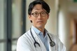 portrait of Asian doctor with serious face and blurred background