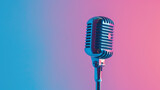 Fototapeta  - Blue retro microphone on a pink background.