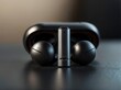 Wireless Earbuds Convenience: A close-up render of wireless earbuds, focusing on their compact size, ergonomic design, and seamless connectivity, illustrating the convenience and freedom of wireless a