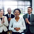 Clapping hands, portrait and business woman with team in office for good news, achievement or goal. Affirmative action, gratitude and financial advisors with applause for empowerment with person.