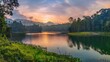 Panoramic lake view with lush forest at twilight