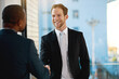 Shaking hands, partnership and business men in office with b2b deal, greeting or introduction for meeting. Corporate, professional and financial advisors with handshake for agreement in workplace.