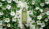 Fototapeta  - A white wine bottle around flowers