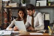 © MiraCle72 - Young business couple engaged in strategic planning at an urban office setting by evening light