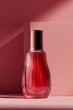 Elegant red perfume bottle on a matching crimson background with a smooth gradient and reflective surface.