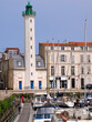 Port and famous Lighthouse white and green of La Rochelle in France, region Poitou Charentes, Charente Maritime department