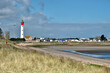 Dune and lighthouse at Ouistreham , commune in the Calvados department in the Basse-Normandie region in northwestern France.
