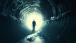 © Abelorz - Man walking in dark tunnel towards light at the end, hope and future path or journey concept. man standing alone inside concrete pipe tunnel. Silhouette of person moving forward with determination
