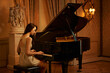 © peopleimages.com - Mansion, woman and piano with musician playing, lounge and pianist in ballroom with luxury instrument. Entertainment, palace and vintage fashion of sound artist with song and dark glamour with style