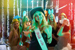 Woman, portrait and bride alcohol in club, bachelorette event and celebration at night party. Female person, cocktail and drinking at happy hour for fun, confident and festival aesthetic for freedom