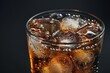 Close-up of a refreshing glass of soda with ice cubes
