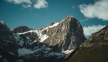 Wall Mural - high mountain with withe snow and blue sky