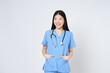 Smiling young asian woman doctor with stethoscope on white background.